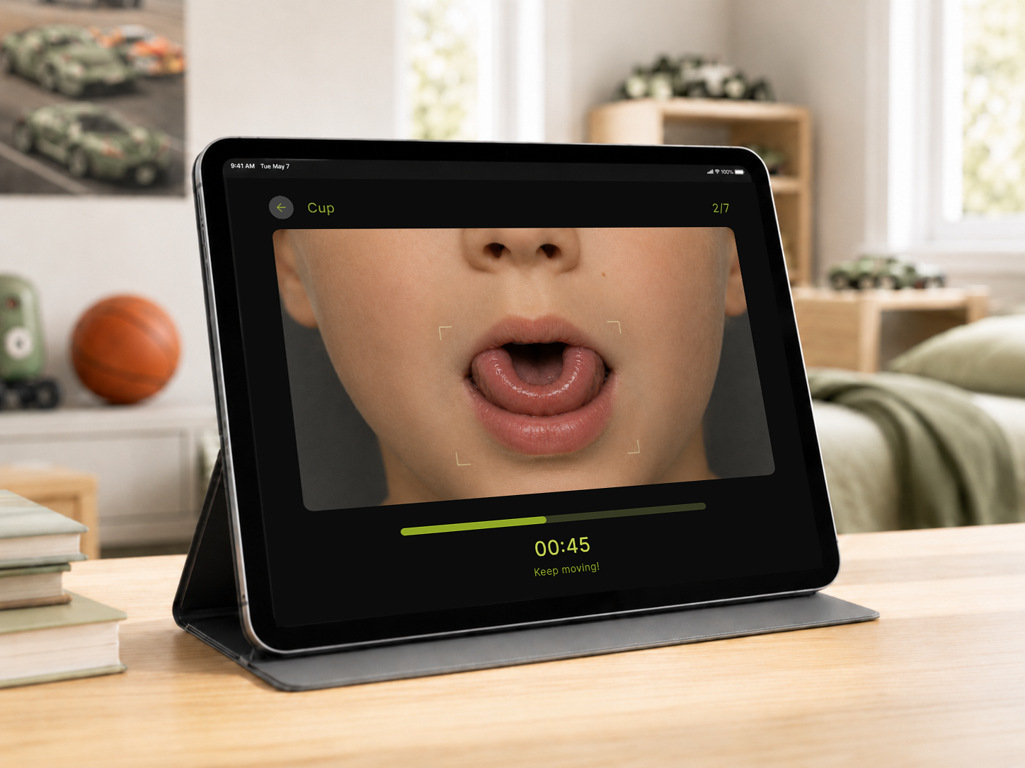 Mouth Ninja app — hands holding phone in low light