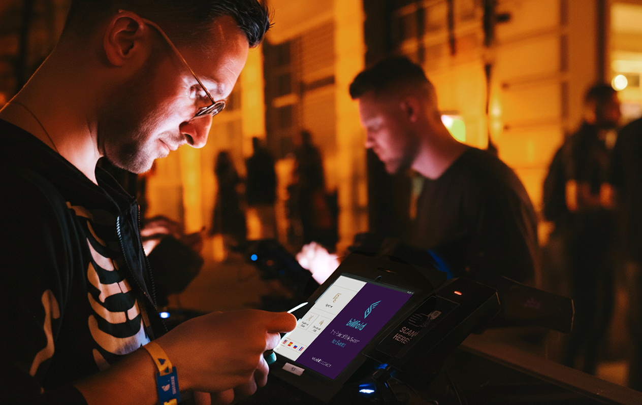 Guest using Billfold check-in kiosk